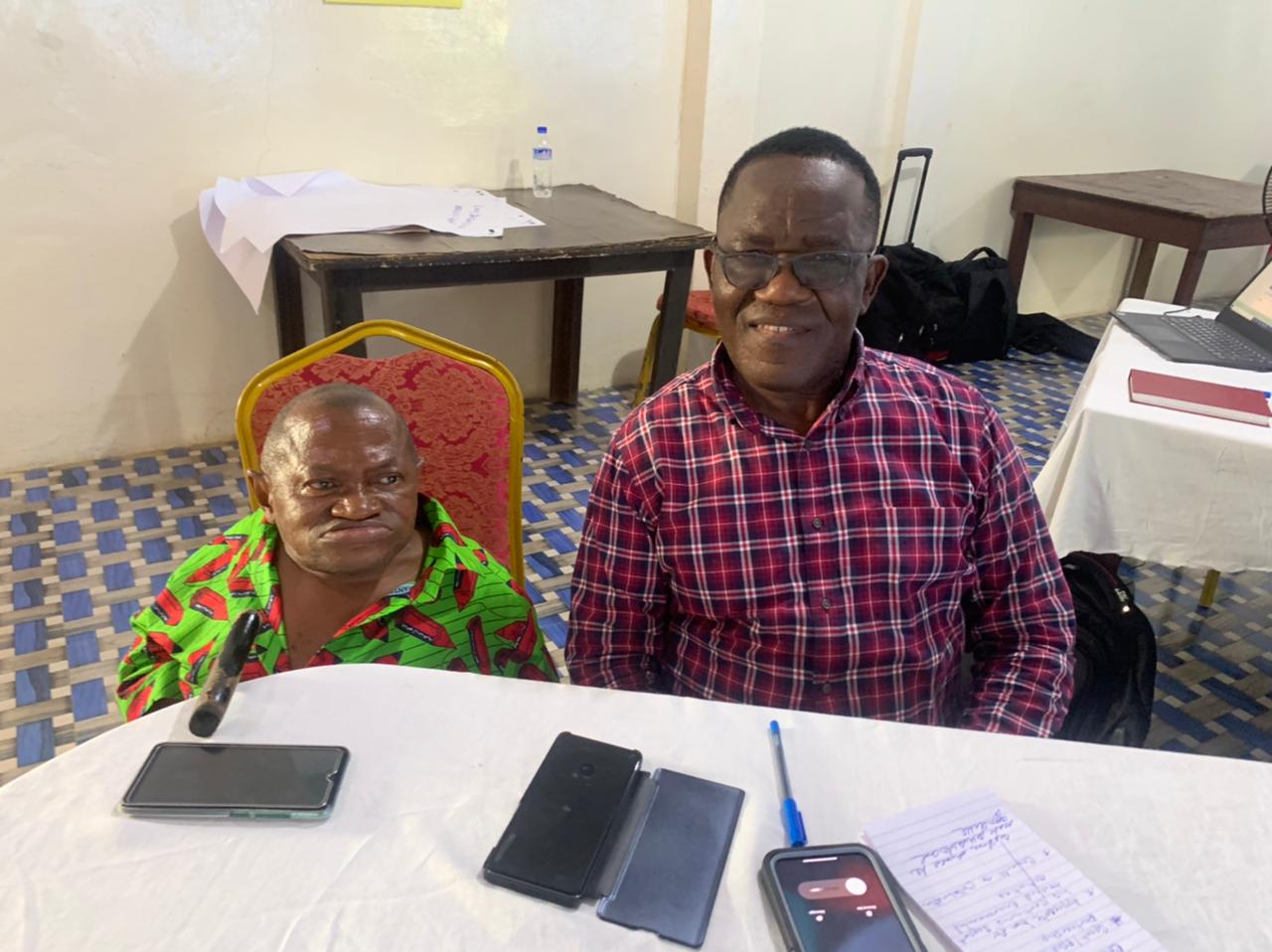 Prof Wilson Tarpeh, Executive Director of Liberia's Environment Protection Agency (R) with the head advocate of the Nimba County Disabled Community Mr. Gabriel T. Soh