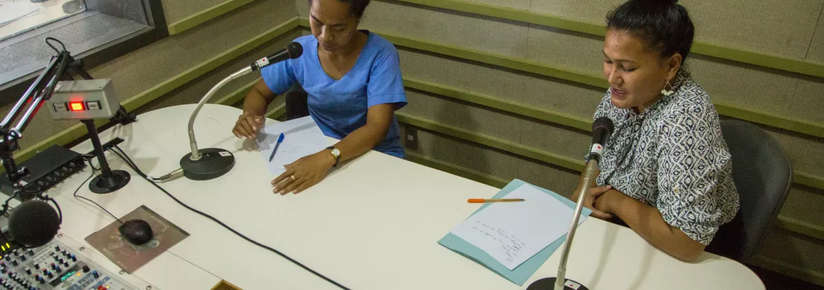 Doctor Christine Lifuka and Akelita Pesega, doing TB awareness at the radio station in Funafuti island in Tuvalu.